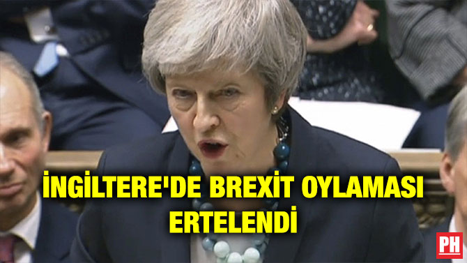 İNGİLTERE’DE BREXİT OYLAMASI ERTELENDİ