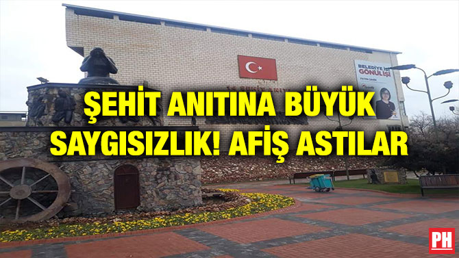ŞEHİT ANITINA BÜYÜK SAYGISIZLIK! AFİŞ ASTILAR