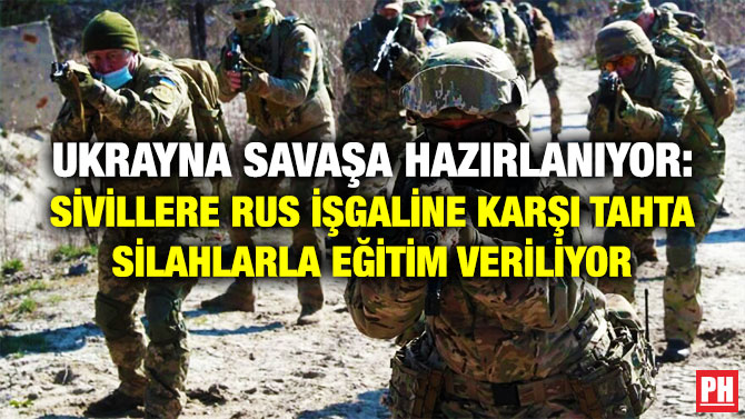Ukrayna Savaşa Hazırlanıyor: Sivillere Rus İşgaline Karşı Tahta Silahlarla Eğitim Veriliyor
